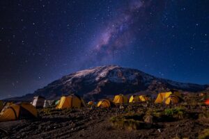 Mount Kilimanjaro Base Camps fullmoon – tents under moonlight in Tanzania