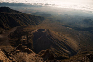 Best Adventure Activities in Tanzania: aerial view of Mount Meru volcanic crater in Arusha National Park showcasing scenic hiking adventure and mountain landscape experience in Tanzania 2026