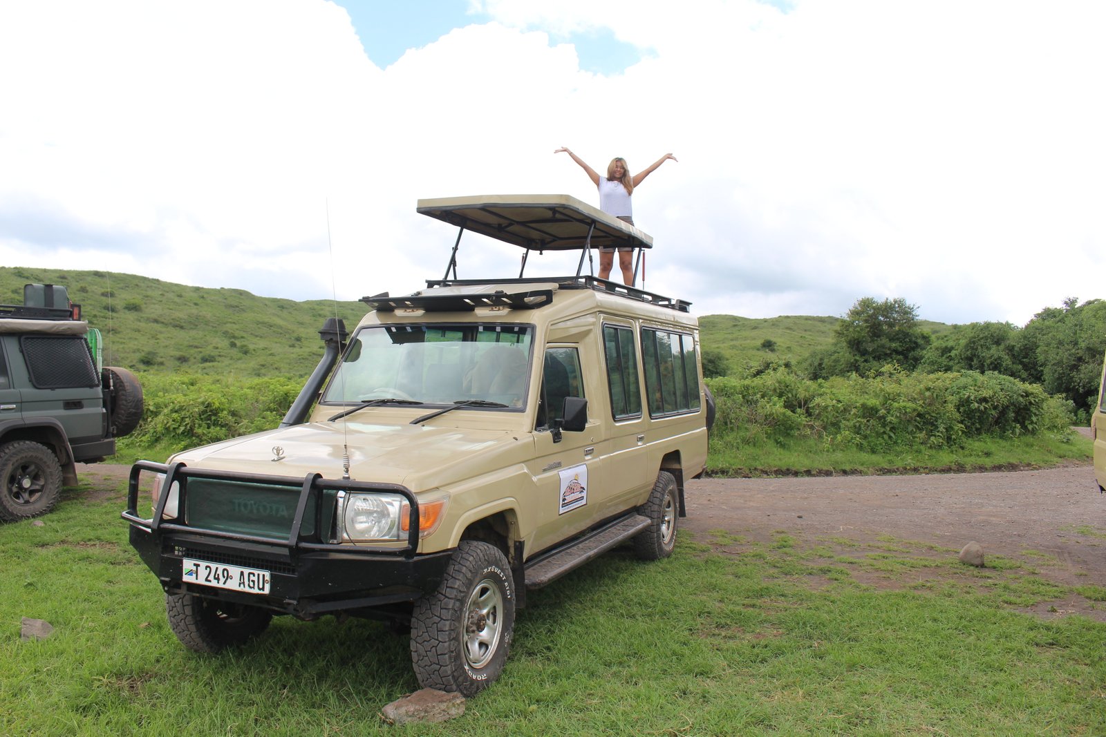 Wildlife safari in Tanzania with a safari vehicle exploring the African wilderness