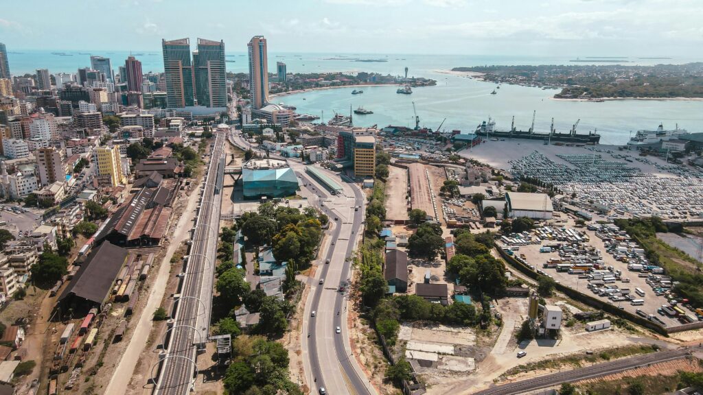Dar es Salaam Port showing cargo ships and cranes representing Tanzania's economic trade and growth